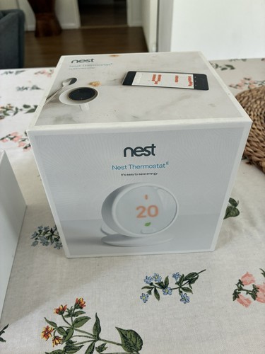 Nest thermostat with - e,